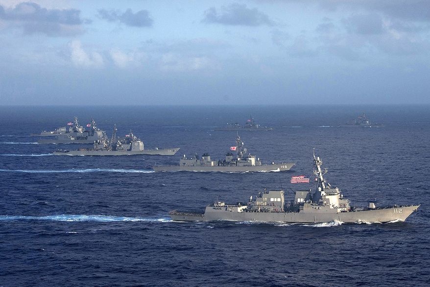 U.S. Navy and Japan Maritime Self-Defense Force ships are underway in formation during Multi-Sail 2015. Multi-Sail is an annual Destroyer Squadron (DESRON) 15 exercise designed to assess combat systems, improve teamwork and increase warfighting capabilities in the U.S. 7th Fleet area of responsibility. The Japan Maritime Self-Defense Force is participating in Multi-Sail for the first time. (U.S. Navy photo by Mass Communication Specialist 2nd Class Daniel M. Young/Released)