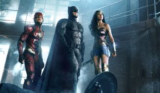 This image released by warner Bros. Pictures shows Ezra Miller, from left, Ben Affleck and Gal Gadot in a scene from &amp;quot;Justice League.&amp;quot;