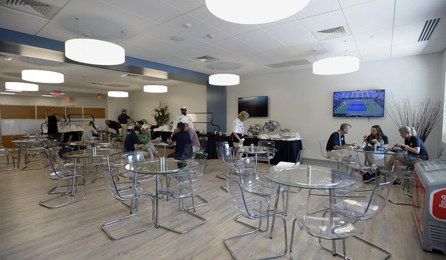 This Saturday, Aug. 26, 2017 photo shows the dining area at the Connecticut Tennis Center at Yale in New Haven, Conn. Officials have begun marketing the venue for conventions and business meetings, part of an effort to get more use out of a stadium that hosts a once-a-year tennis tournament. (AP Photo/Jessica Hill)