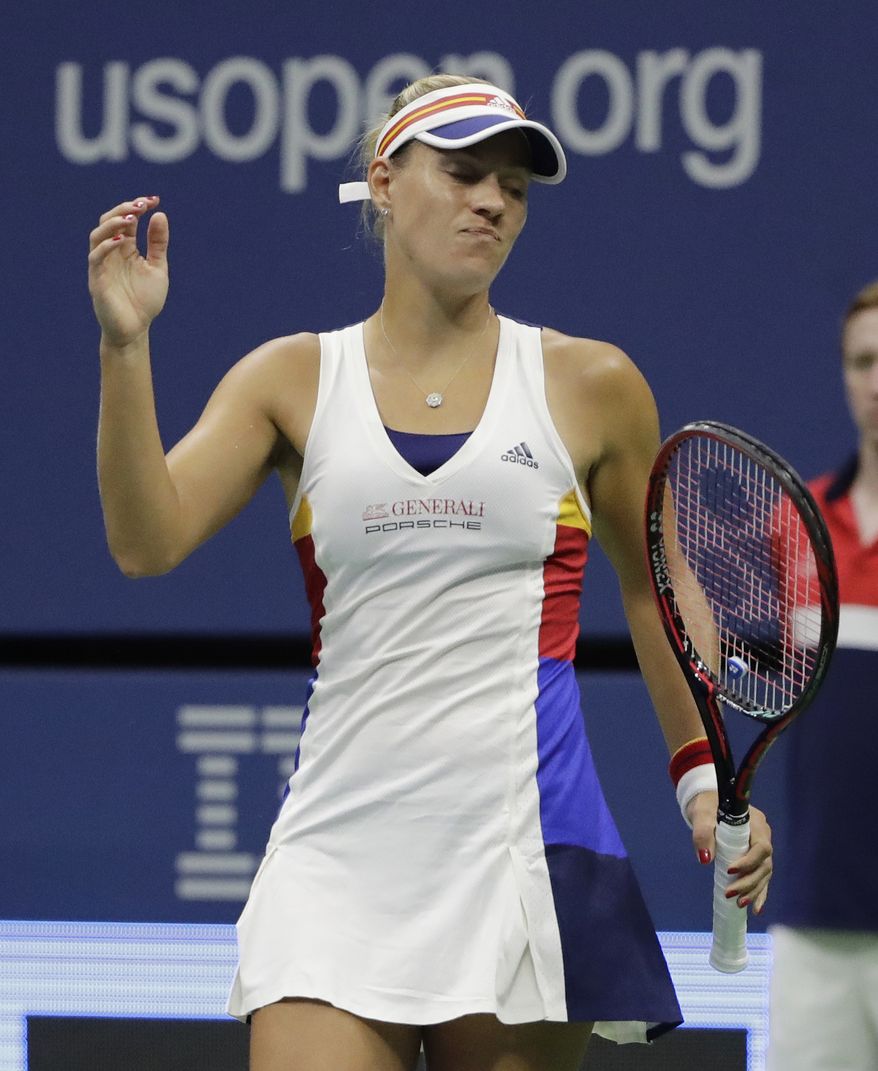 RETRANSMISSION TO PLAYER TO NAOMI OSAKA - Angelique Kerber, of Germany, reacts after losing a point to Naomi Osaka of Japan, during the first round of the U.S. Open tennis tournament, Tuesday, Aug. 29, 2017, in New York. (AP Photo/Frank Franklin II)