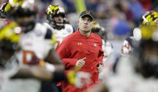FILE - In this Monday, Dec. 26, 2016 file photo, Maryland head coach DJ Durkin runs onto the field before the Quick Lane Bowl NCAA college football game against Boston College in Detroit. There were several reasons why Tyrrell Pigrome won the starting quarterback job at Maryland, not the least of which are experience, running ability and leadership skills. Coach DJ Durkin took all that under consideration, then decided that the 5-foot-11 sophomore should be the one to lead the offense against No. 23 Texas in season opener on Saturday, Sept. 2, 2017. (AP Photo/Carlos Osorio, File)