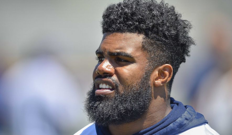 FILE - This is a July 25, 2017, file photo showing Dallas Cowboys running back Ezekiel Elliott during NFL football training camp in Oxnard, Calif. Elliott's appeal of his six-game suspension over a domestic violence incident is headed for a second day with no timeline for completion of the hearing. (AP Photo/Gus Ruelas, File)