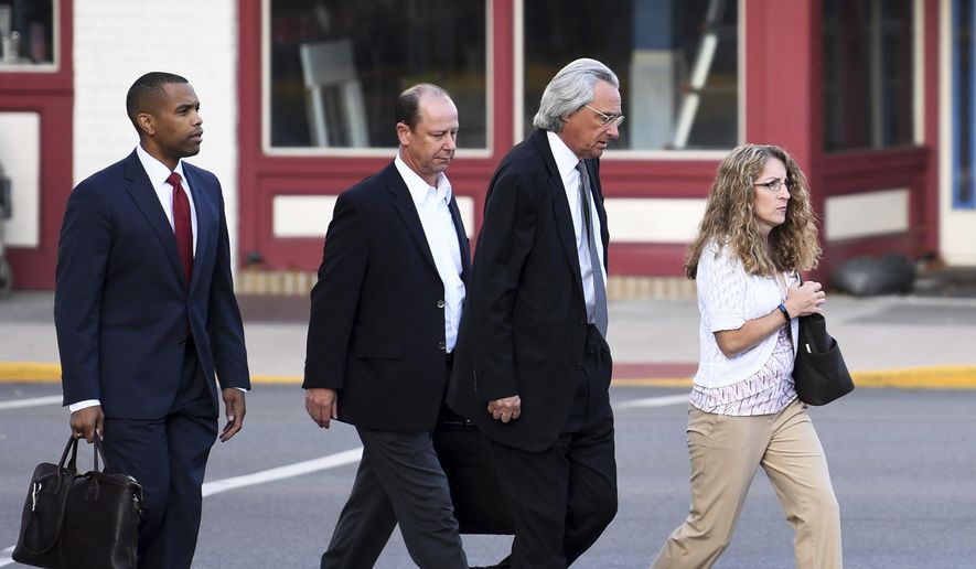 From right, Evelyn Piazza, attorney Tom Kline and Jim Piazza and walk toward the courthouse before a preliminary hearing resumes for members of a fraternity facing criminal charges over the death of Timothy Piazza, at the Centre County Courthouse in Bellefonte, Pa. Piazza, a 19-year-old sophomore, suffered severe head and abdominal injuries last February, after consuming a dangerous amount of alcohol and fell repeatedly. Help wasn't summoned until the next morning, and he later died at a hospital. (Phoebe Sheehan/Centre Daily Times via AP)