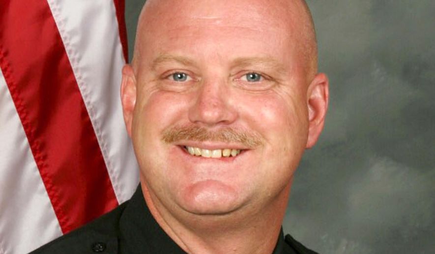 This undated photo provided by the Sacramento County Sheriff's Department shows Deputy Robert French. A gunman with an assault rifle shot and killed French, 52, and wounded two California Highway Patrol officers Wednesday, Aug. 30, 2017 at a Sacramento, Calif., hotel that was later surrounded by officers searching for suspects. French, a 21-year veteran of the Sacramento County Sheriff's Department, died on the way to a hospital. (Sacramento County Sheriff's Department via AP)