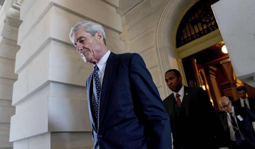 In this June 21, 2017, file photo, former FBI Director Robert Mueller, the special counsel probing Russian interference in the 2016 election, departs Capitol Hill following a closed-door meeting in Washington. (AP Photo/Andrew Harnik, File)