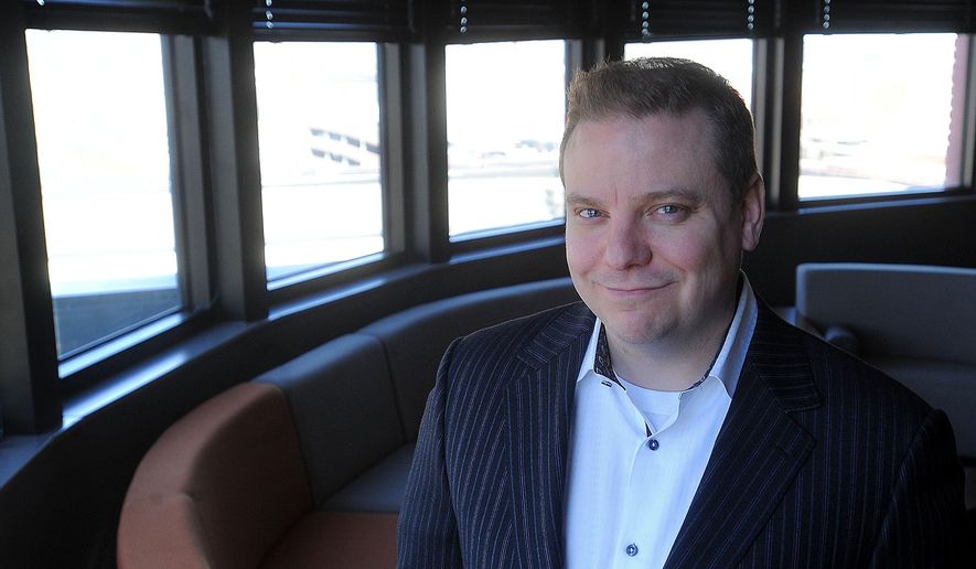In this March 11, 2016 photo, Tobias Ritesman with Ritesman Enterprises poses for a photo in Sioux Falls, S.D. Ritesman Enterprises, parent company of a rapidly expanding collection of multinational companies, has officially opened its headquarters in downtown Sioux Falls, S.D. (Jay Pickthorn/The Argus Leader via AP)