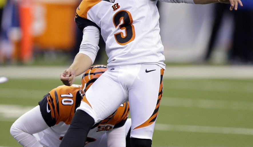 Cincinnati Bengals' Jake Elliott watches his 50-yard field goal during the first half of a preseason NFL football game against the Indianapolis Colts in Indianapolis, Thursday, Aug. 31, 2017. (AP Photo/Michael Conroy)