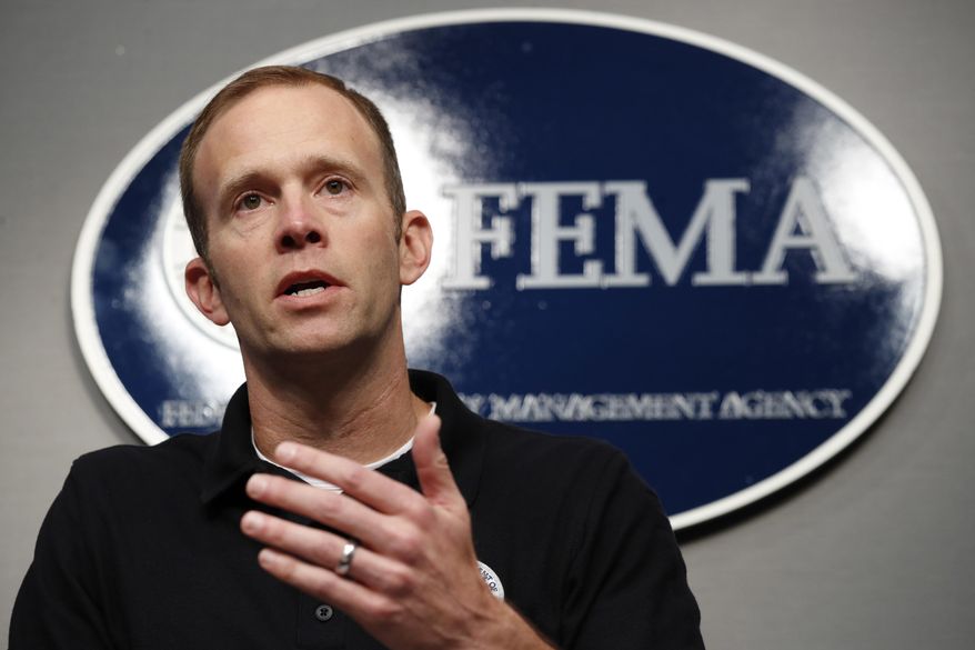 Federal Emergency Management Agency (FEMA) Administrator Brock Long speaks during a news conference in Washington, Thursday, Aug. 31, 2017, about Harvey's devastating flooding. (AP Photo/Jacquelyn Martin)