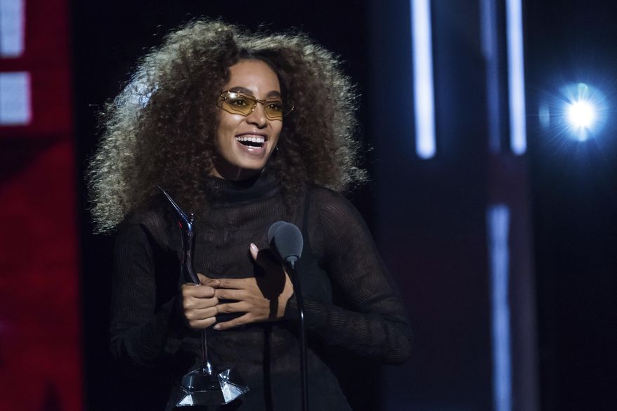FILE - In this Aug. 5, 2017, file photo, Honoree Solange Knowles attends the Black Girls Rock! Awards at the New Jersey Performing Arts Center in Newark, N.J. Houston native Solange and rock band Fall Out Boy are planning to donate proceeds from their concerts to help those affected by Tropical Depression Harvey. Solange said she’ll give all of the earnings from her Sept. 28 show in Boston to those affected by Harvey. (Photo by Charles Sykes/Invision/AP, File)