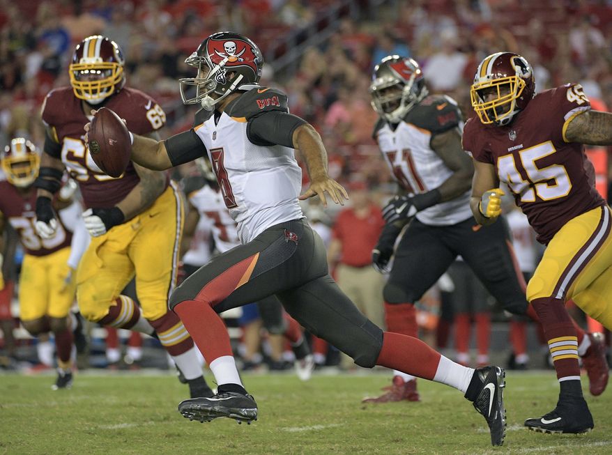 Tampa Bay Buccaneers quarterback Sefo Liufau (8) runs away from Washington Redskins defensive tackle A.J. Francis (69) and linebacker Pete Robertson (45) during the second quarter of an NFL preseason football game Thursday, Aug. 31, 2017, in Tampa, Fla. (AP Photo/Phelan Ebenhack)