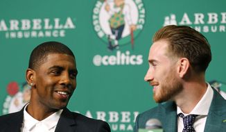 Boston Celtics&#39; Kyrie Irving, left, and Gordon Hayward talk during a news conference in Boston, Friday, Sept. 1, 2017. (AP Photo/Winslow Townson)