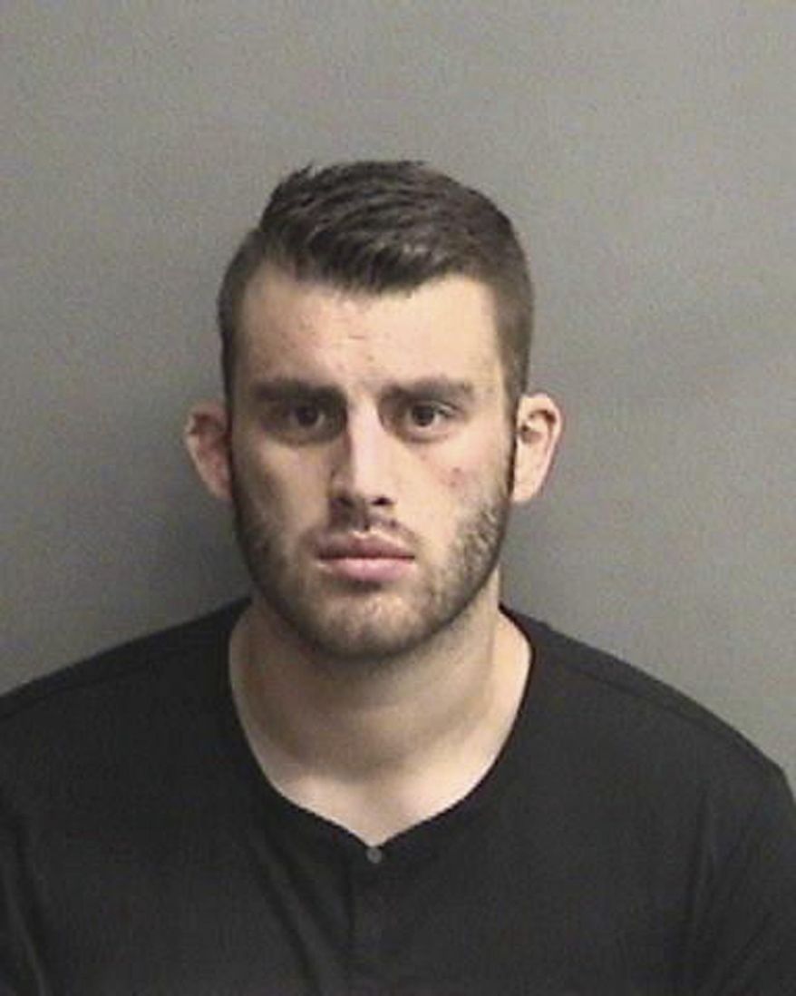 This undated photo provided by the Alameda County Sheriff's Office shows Alameda County Sheriff's Deputy Erik McDermott. McDermott is one of four Alameda County Sheriff's deputies arrested and accused of allowing a maximum-security prisoner to throw feces and urine at other inmates. (Alameda County Sheriff's Office via AP)