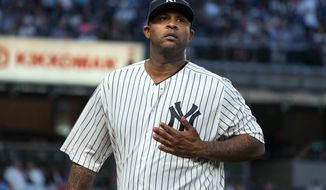 New York Yankees pitcher C. C. Sabathia walks to the dugout after striking out a Boston Red Sox batter to end the top of the first inning of a baseball game Thursday, Aug. 31, 2017, in New York. (AP Photo/Craig Ruttle)