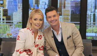 In this Monday, May 1, 2017, file photo, released by Disney/ABC Home Entertainment and TV Distribution, Kelly Ripa and Ryan Seacrest pose for a photo at &amp;quot;Live&amp;quot; in New York. (Pawel Kaminski/Disney/ABC Home Entertainment and TV Distribution via AP)