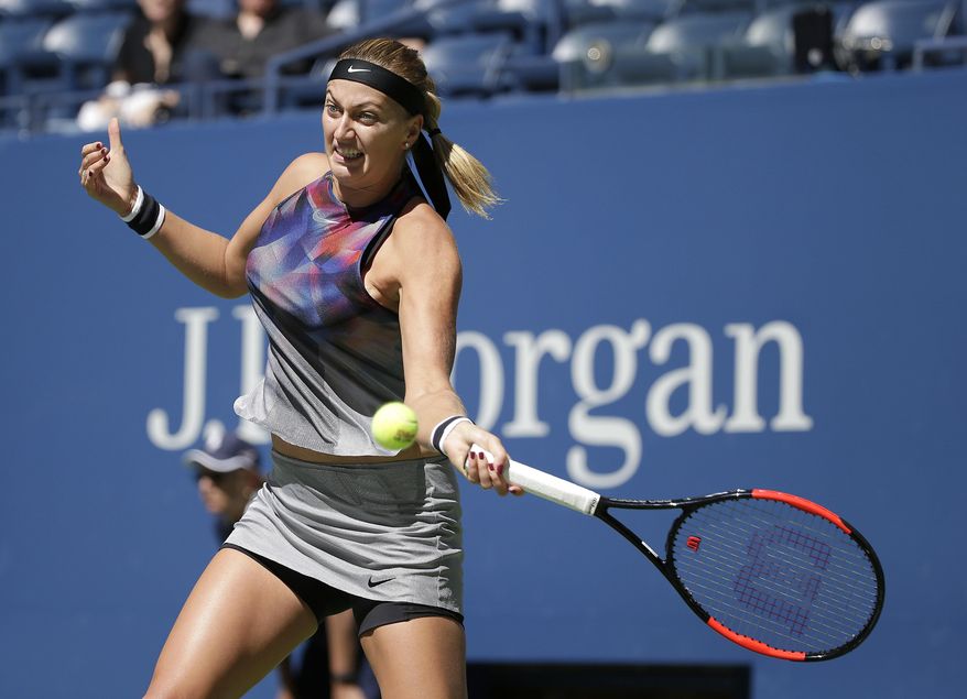Petra Kvitova, of the Czech Republic, returns a shot from Caroline Garcia, of France, during the third round of the U.S. Open tennis tournament, Friday, Sept. 1, 2017, in New York. (AP Photo/Seth Wenig)