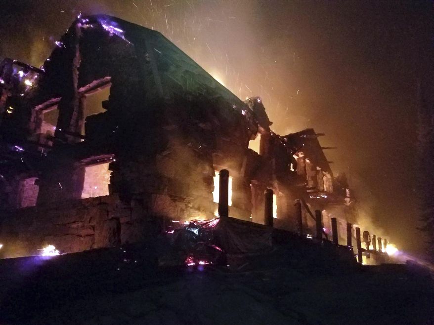 This Thursday, Aug. 31, 2017, image from video provided by the Hutton Incident Team shows the historic main Sperry Chalet building engulfed in flames in Glacier National Park, Mont. Glacier National Park's historic Sperry Chalet was lost to the Sprague Fire overnight. (Hutton IncidentTeam via AP)