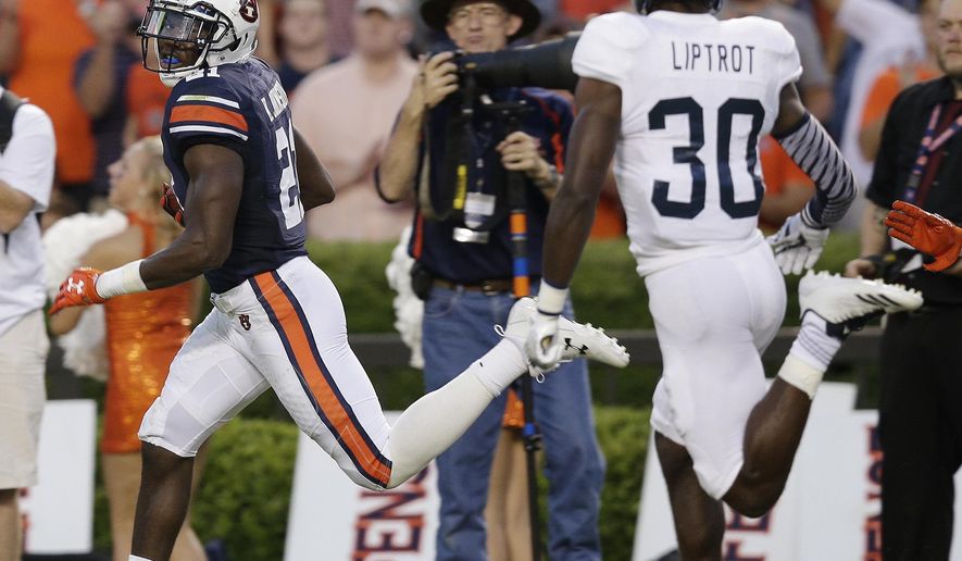 Auburn running back Kerryon Johnson runs into the end zone to score a touchdown in the first half of an NCAA college football game against Georgia Southern, Saturday, Sept. 2, 2017, in Auburn, Ala. (AP Photo/Brynn Anderson)