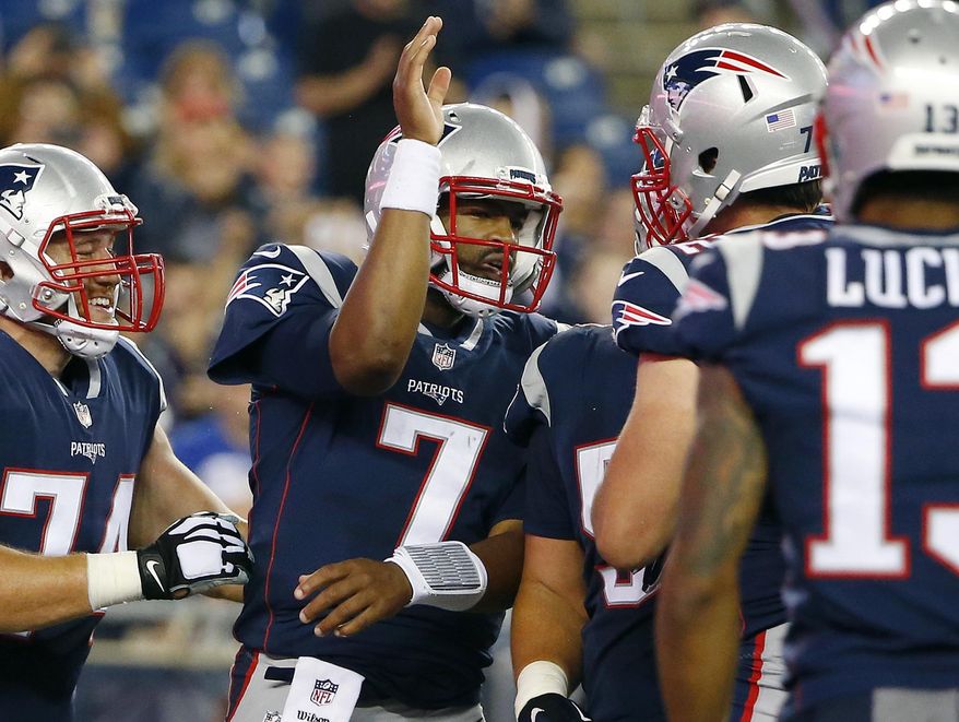 New England Patriots quarterback Jacoby Brissett (7) celebrates with teammates after running for a touchdown against the New York Giants during the second half of an NFL preseason football game, Thursday, Aug. 31, 2017, in Foxborough, Mass. (AP Photo/Winslow Townson)