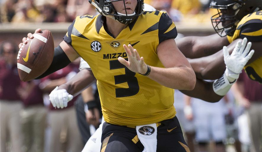 Missouri quarterback Drew Lock scrambles as he throws the ball during the third quarter of an NCAA college football game against Missouri State Saturday, Sept. 2, 2017, in Columbia, Mo. (AP Photo/L.G. Patterson)