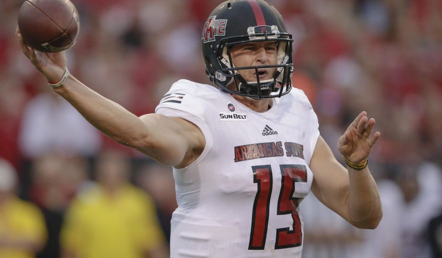 Arkansas State quarterback Justice Hansen (15) throws during the first half of an NCAA college football game against Nebraska in Lincoln, Neb., Saturday, Sept. 2, 2017. (AP Photo/Nati Harnik)