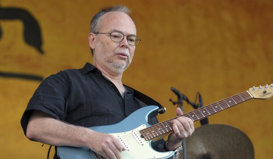 In this Sunday, May 6, 2007, file photo, Walter Becker, of Steely Dan, performs during the 2007 Jazz and Heritage Festival in New Orleans. Becker, the guitarist, bassist and co-founder of the rock group Steely Dan, has died. He was 67. His official website announced his death Sunday, Sept. 3, 2017, with no further details. (AP Photo/Dave Martin, File)
