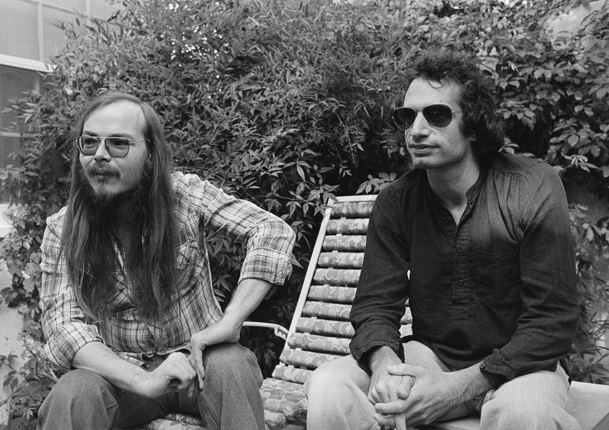 FILE - In this Oct. 29, 1977, file photo, Walter Becker, left, and Donald Fagen of Steely Dan, sit in Los Angeles. Becker, the guitarist, bassist and co-founder of the rock group Steely Dan, has died. He was 67. His official website announced his death Sunday, Sept. 3, 2017, with no further details. (AP Photo/Nick Ut, File)