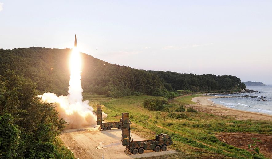 In this photo provided by South Korea Defense Ministry, South Korea&#x27;s Hyunmoo II ballistic missile is fired during an exercise at an undisclosed location in South Korea, Monday, Sept. 4, 2017. In South Korea, the nation&#x27;s military said it conducted a live-fire exercise simulating an attack on North Korea&#x27;s nuclear test site to &quot;strongly warn&quot; Pyongyang over the latest nuclear test. Seoul&#x27;s Joint Chiefs of Staff said the drill involved F-15 fighter jets and the country&#x27;s land-based &quot;Hyunmoo&quot; ballistic missiles. The released live weapons &quot;accurately struck&quot; a target in the sea off the country&#x27;s eastern coast, the JCS said. (South Korea Defense Ministry via AP)