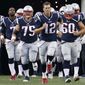 In this Aug. 10, 2017, file photo, New England Patriots quarterback Tom Brady (12) leads his team onto the field during an NFL preseason football game, in Foxborough, Mass. (AP Photo/Mary Schwalm, File)