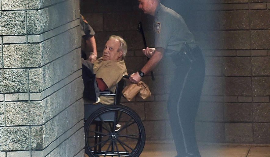FILE - In this April 20, 2015, file photo, Robert Gentile is brought into the federal courthouse in a wheelchair for a continuation of a hearing in Hartford, Conn. Gentile, a reputed Connecticut mobster who authorities say is the last surviving person of interest in the largest art heist in U.S. history, is set to be sentenced on unrelated weapons convictions. He is scheduled to be sentenced Tuesday, Sept. 5, 2017, in federal court in Hartford. (Cloe Poisson/The Courant via AP, File)