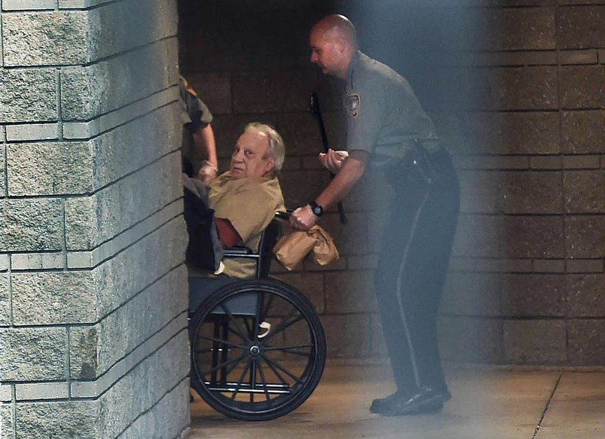 FILE - In this April 20, 2015, file photo, Robert Gentile is brought into the federal courthouse in a wheelchair for a continuation of a hearing in Hartford, Conn. Gentile, a reputed Connecticut mobster who authorities say is the last surviving person of interest in the largest art heist in U.S. history, is set to be sentenced on unrelated weapons convictions. He is scheduled to be sentenced Tuesday, Sept. 5, 2017, in federal court in Hartford. (Cloe Poisson/The Courant via AP, File)