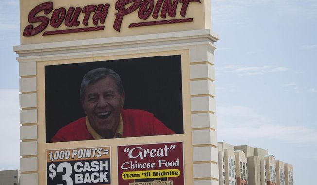 The South Point hotel-casino displays a tribute to the late actor and comedian Jerry Lewis during a private memorial at the hotel in Las Vegas, Monday, Sept. 4, 2017. (Erik Verduzco//Las Vegas Review-Journal via AP)