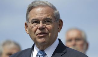 FILE - In this Thursday, Aug. 17, 2017, file photo, Sen. Bob Menendez, D-N.J., speaks during a news conference, in Union Beach, N.J. Opening statements are scheduled for Wednesday, Sept. 6, in the trial of Menendez and Florida ophthalmologist, Dr. Salomon Melgen. They are charged with a conspiracy in which, prosecutors say, Menendez lobbied for Melgen’s business interests in exchange for political donations and gifts. (AP Photo/Julio Cortez, File)