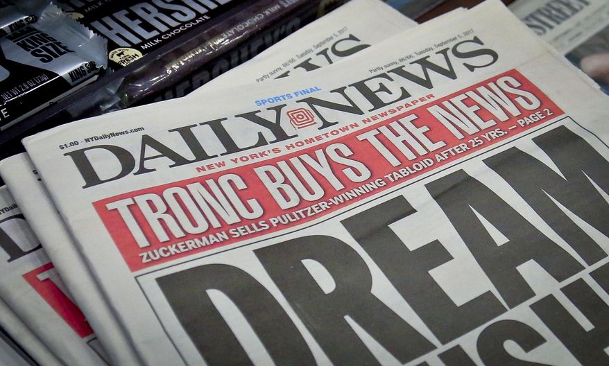 A newsstand display copies of the Daily News, Tuesday Sept. 5, 2017, in New York. The tabloid newspaper has been acquired by Tronc, the publisher of the Los Angeles Times and The Chicago Tribune, in a deal announced Monday night, Sept. 4. . (AP Photo/Bebeto Matthews)