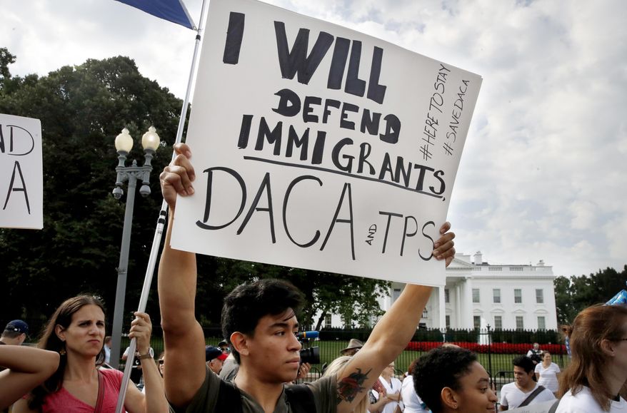 Diego Rios, 23, of Rockville, Md., rallies in support of the Deferred Action for Childhood Arrivals program, known as DACA, outside of the White House, in Washington, Tuesday, Sept. 5, 2017. President Donald Trump will end a program that has protected hundreds of thousands of young immigrants brought into the country illegally as children and call for Congress to find a legislative solution. Attorney General Jeff Sessions announced the changes Tuesday. (AP Photo/Jacquelyn Martin)