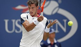 Pablo Carreno Busta, of Spain, returns a shot from Diego Schwartzman, of Argentina, during the quarterfinals of the U.S. Open tennis tournament, Tuesday, Sept. 5, 2017, in New York. (AP Photo/Jason Decrow)