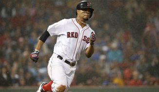 Boston Red Sox&#39;s Xander Bogaerts runs on a triple against the Toronto Blue Jays during the fourth inning of a baseball game at Fenway Park in Boston, Wednesday, Sept. 6, 2017. (AP Photo/Winslow Townson)
