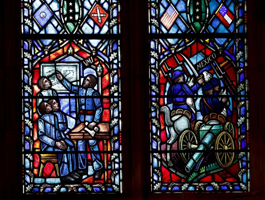A detail of stained glass windows depicting two iconic Confederate generals that are being removed is seen at the Washington National Cathedral in Washington, Wednesday, Sept. 6, 2017. Cathedral authorities announced Wednesday that windows depicting generals Robert E. Lee and Thomas "Stonewall" Jackson will be removed and stored pending a decision about their future. (AP Photo/Carolyn Kaster)