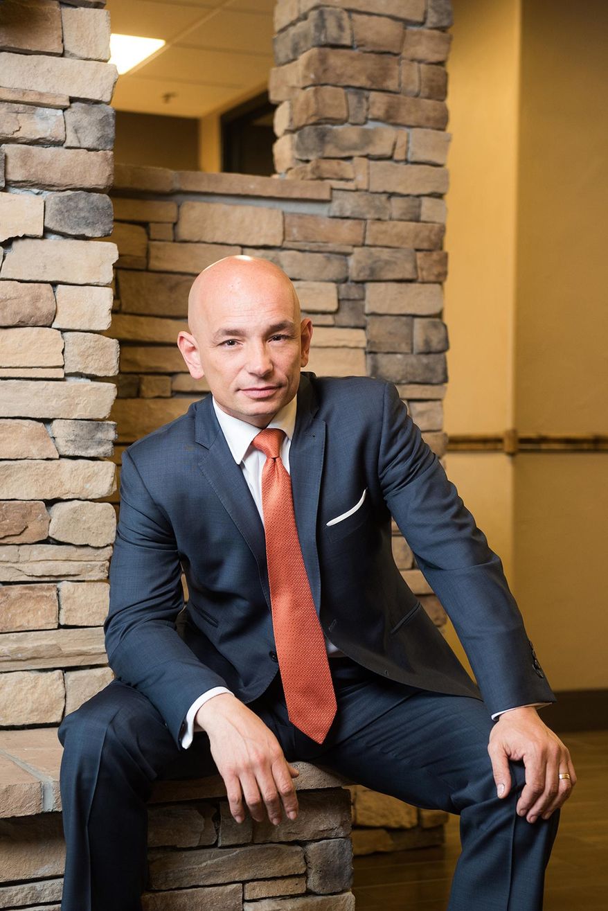 This April 5, 2016 photo shows Anthony Melchiorri, the star of Travel Channel's "Hotel Impossible," at the Big Bear Motel in Cody , Wyo. Melchiorri is entering his seventh season as the hotel fixer on "Hotel Impossible," and is as passionate as ever about perfecting standards in the hospitality industry. (Taylor Glenn/Travel Channel via AP)