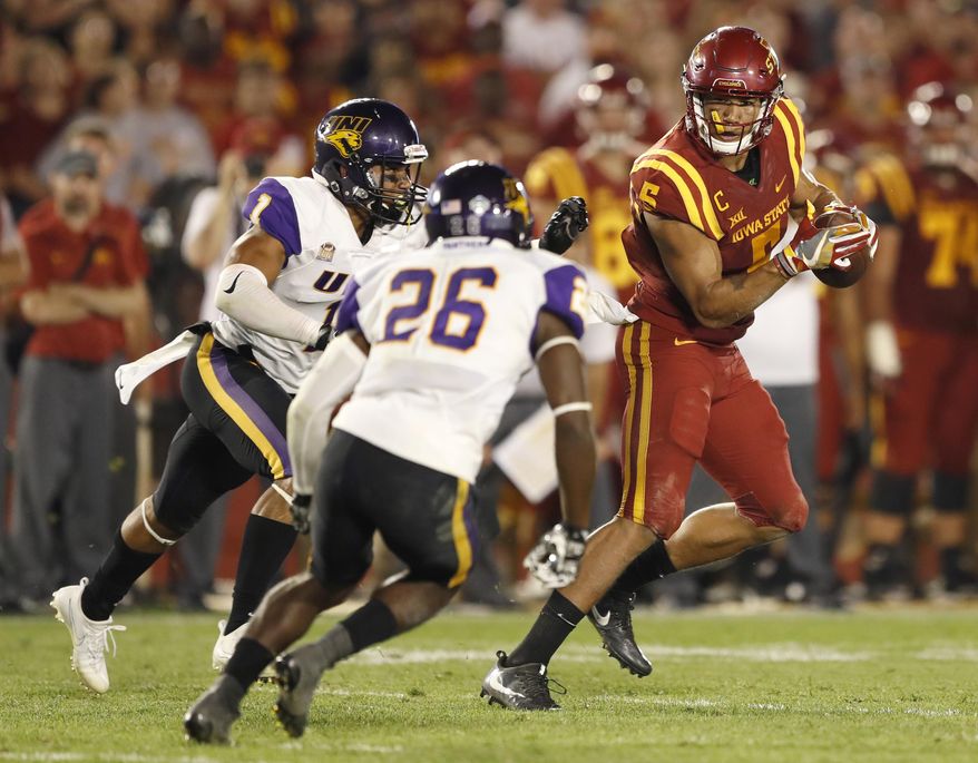 FILE - In this Sept. 2, 2017, file photo, Iowa State wide receiver Allen Lazard, right, runs from Northern Iowa's Elijah Campbell, left, and Isaiah Nimmers (26) after making a reception during the second half of an NCAA college football game, in Ames, Iowa. This year's Iowa-Iowa State game might feature as much in-state talent as any matchup in recent memory. (AP Photo/Charlie Neibergall, File)