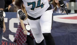 This photo taken Aug. 10, 2017, shows Jacksonville Jaguars offensive tackle Cam Robinson warming up before an NFL preseason football game against the New England Patriots, in Foxborough, Mass. Robinson&#39;s NFL debut should be the ultimate, some might call it unfair, challenge. The Jaguars rookie will make his first career start Sunday at Houston, where he will face arguably the league&#39;s premier trio of pass-rushers in four-time All-Pro J.J. Watt, Jadeveon Clowney and Whitney Mercilus. (AP Photo/Steven Senne)