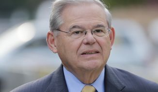 Sen. Bob Menendez arrives to court for his federal corruption trial in Newark, N.J., Wednesday, Sept. 6, 2017.  The trial  will examine whether he lobbied for Florida ophthalmologist Dr. Salomon Melgen&#39;s business interests in exchange for political donations and gifts. Both have pleaded not guilty. (AP Photo/Seth Wenig)