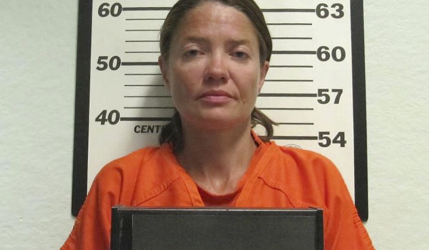 This Wednesday, Sept. 6, 2017 booking photo released by the Iowa County Sheriff's Department shows Mariana Lesnic, in Marengo, Iowa, who is charged with first-degree murder in the shooting of a truck driver found dead in his cab at a rest stop early Wednesday, along Interstate 80 near Victor, Iowa. (Iowa County Sheriff's Department via AP)