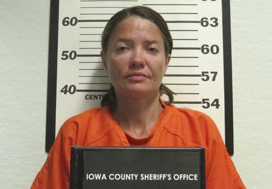 This Wednesday, Sept. 6, 2017 booking photo released by the Iowa County Sheriff's Department shows Mariana Lesnic, in Marengo, Iowa, who is charged with first-degree murder in the shooting of a truck driver found dead in his cab at a rest stop early Wednesday, along Interstate 80 near Victor, Iowa. (Iowa County Sheriff's Department via AP)