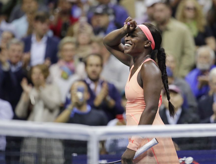 Sloane Stephens, of the United States, reacts after defeating Venus Williams, of the United States, during the semifinals of the U.S. Open tennis tournament, Thursday, Sept. 7, 2017, in New York. (AP Photo/Julio Cortez)