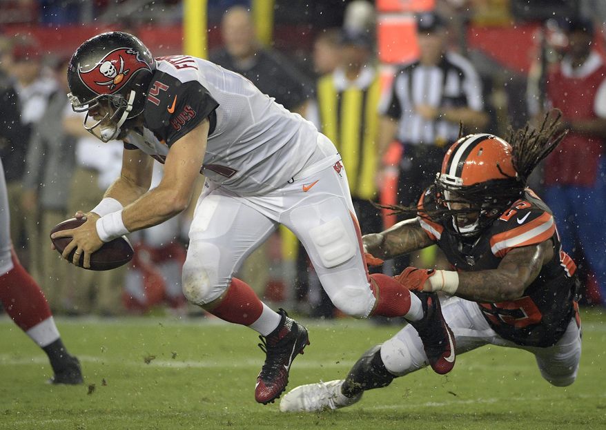 FILE - In this Aug. 26, 2017, file photo, Tampa Bay Buccaneers quarterback Ryan Fitzpatrick (14) is sacked by Cleveland Browns' Calvin Pryor (25) during the fourth quarter of an NFL preseason football game in Tampa, Fla. The Browns have released safety Calvin Pryor after he was involved in a fight with wide receiver Ricardo Louis before practice Thursday, Sept. 7, 2017. (AP Photo/Phelan Ebenhack, File)