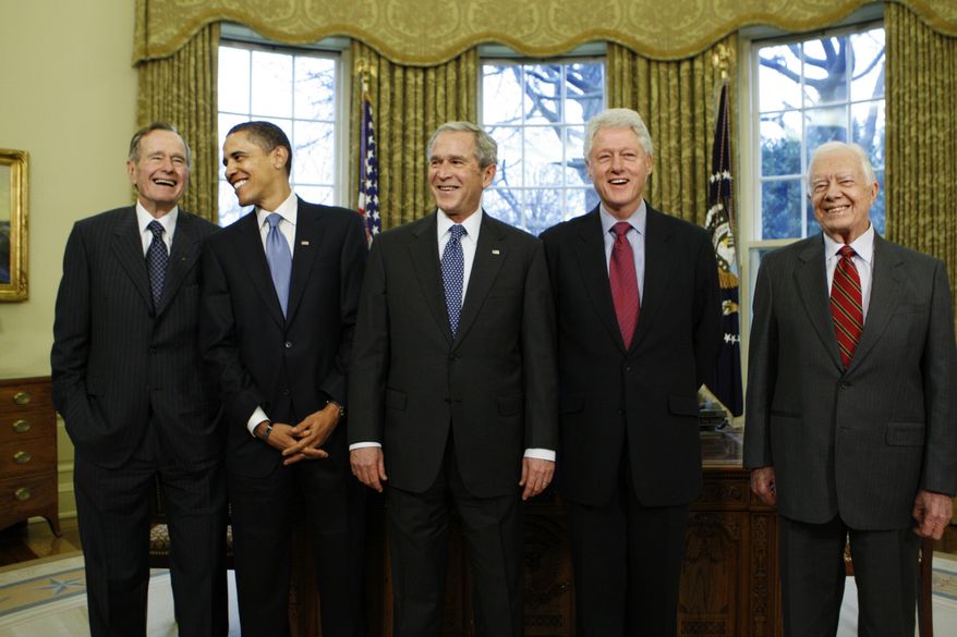 In this Jan. 7, 2009, file photo, then-President-elect Barack Obama is welcomed by then-President George W. Bush for a meeting at the White House in Washington, Wednesday, Jan. 7, 2009, with former presidents, from left, George H.W. Bush, Bill Clinton and Jimmy Carter. The five living former U.S. presidents are creating the "One America Appeal" to raise money for storm recovery as Texas and Louisiana regroup from Harvey and Florida braces for Hurricane Irma. (AP Photo/J. Scott Applewhite, File)