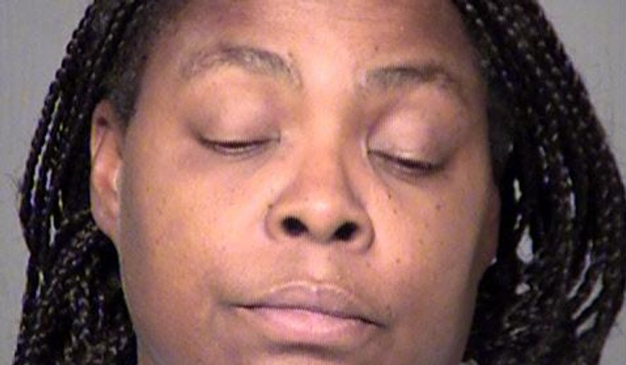 This undated booking photo provided by the Maricopa County Sheriff shows Dorothy Lee. Glendale police have arrested Lee in the shotgun killing of another woman described as an acquaintance. Police say Lee was arrested Wednesday, Sept. 6, 2017, on suspicion of first-degree murder and aggravated assault with a deadly weapon in the Sept. 1 killing of 57-year-old Linda Harris. (Maricopa County Sheriff via AP)