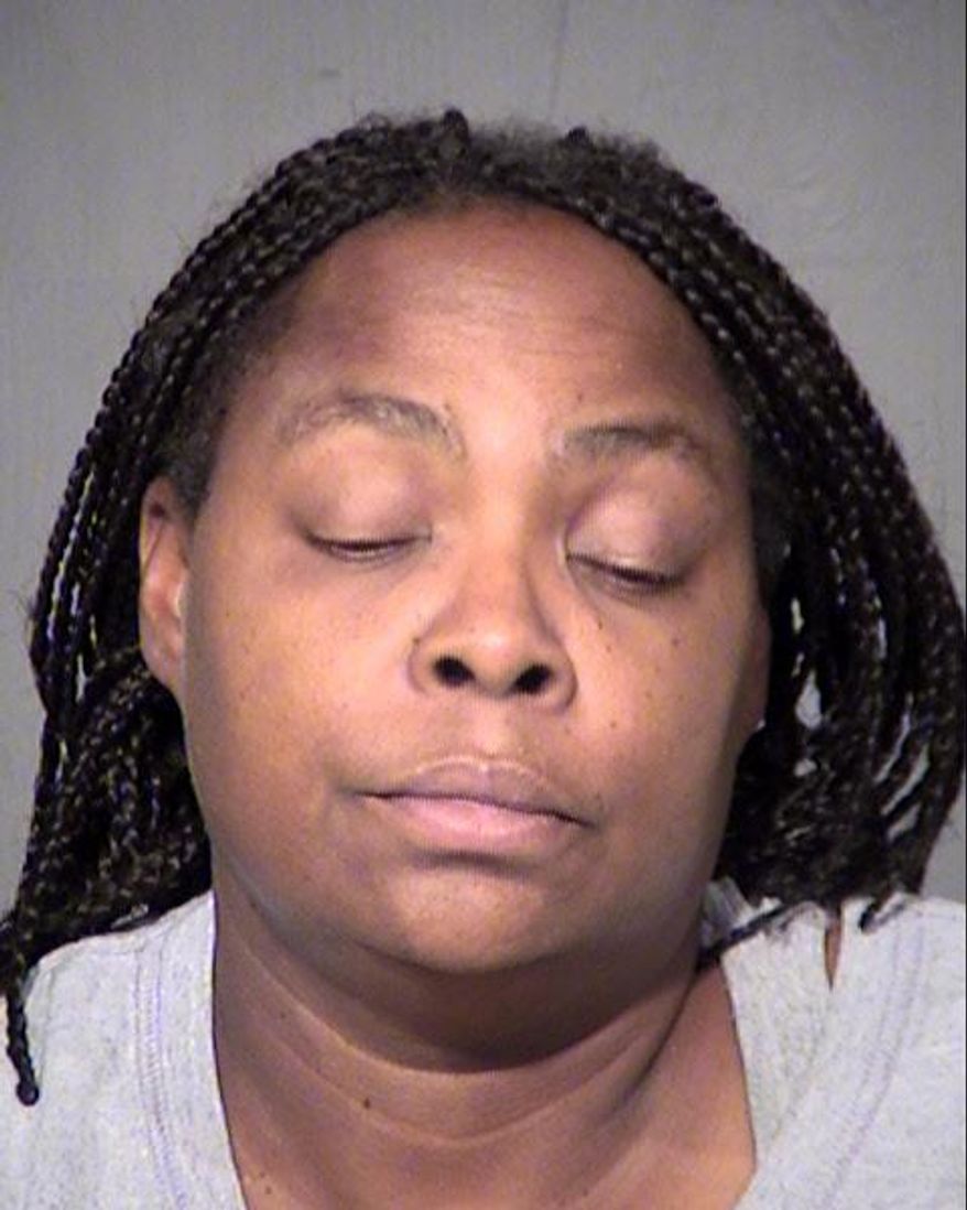 This undated booking photo provided by the Maricopa County Sheriff shows Dorothy Lee. Glendale police have arrested Lee in the shotgun killing of another woman described as an acquaintance. Police say Lee was arrested Wednesday, Sept. 6, 2017, on suspicion of first-degree murder and aggravated assault with a deadly weapon in the Sept. 1 killing of 57-year-old Linda Harris. (Maricopa County Sheriff via AP)