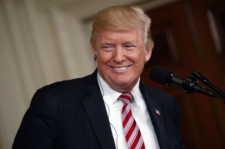 President Donald Trump smiles Kuwait leader Sheikh Sabah Al Ahmad Al Sabah during a news conference in the East Room of the White House, Thursday, Sept. 7, 2017, in Washington. (AP Photo/Evan Vucci)