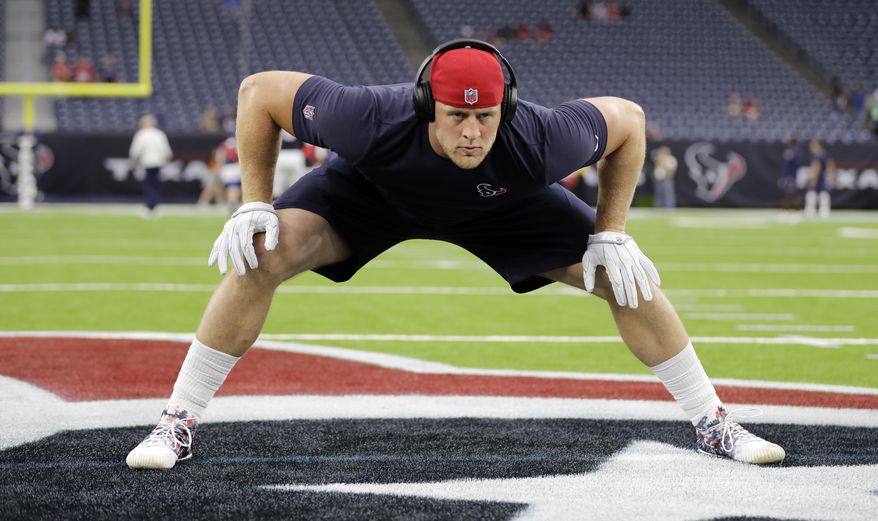 FILE - In this Aug. 19, 2017, file photo, Houston Texans defensive end J.J. Watt warms up before an NFL football preseason game against the New England Patriots in Houston. Watt has not played since Sept. 22, 2016, after missing the final 13 games of last season following his second back surgery. (AP Photo/David J. Phillip, File)